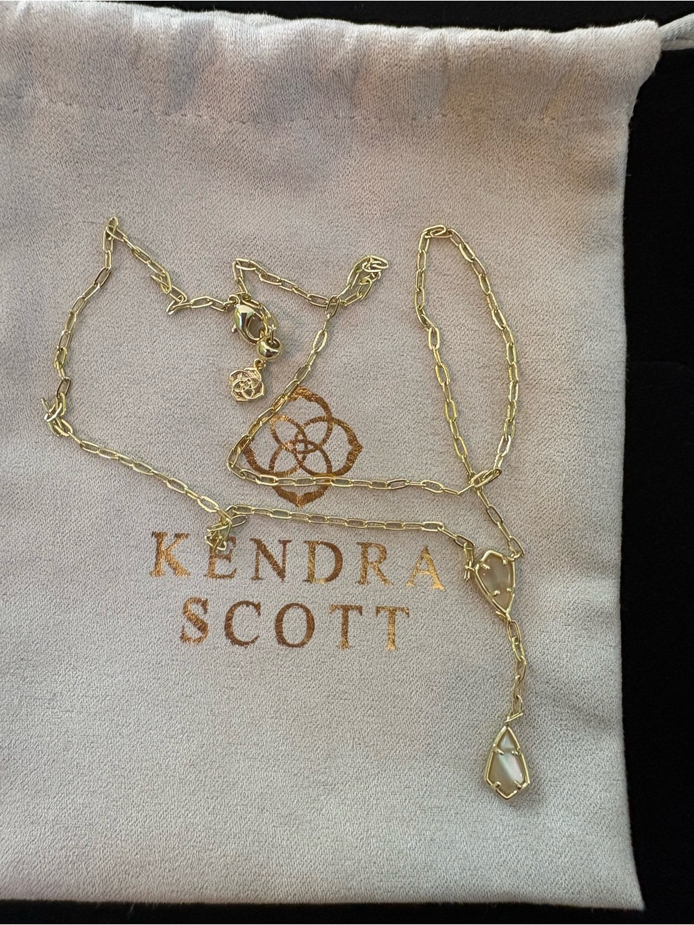 Kendra Scott Gold Paperclip Lariat Necklace with pearl colored Stone
